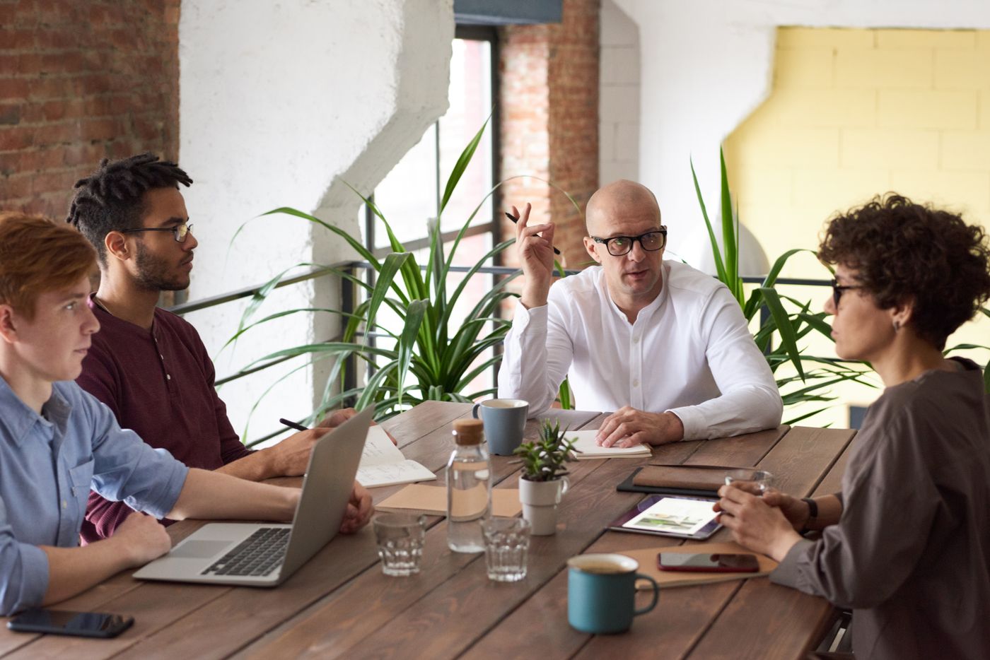 A small team working together around a table